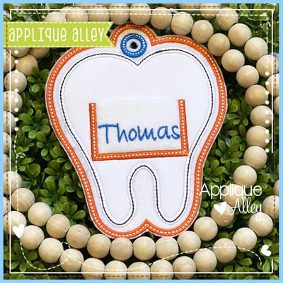 BAG TAG TOOTH WITH POCKET 6998AAEH